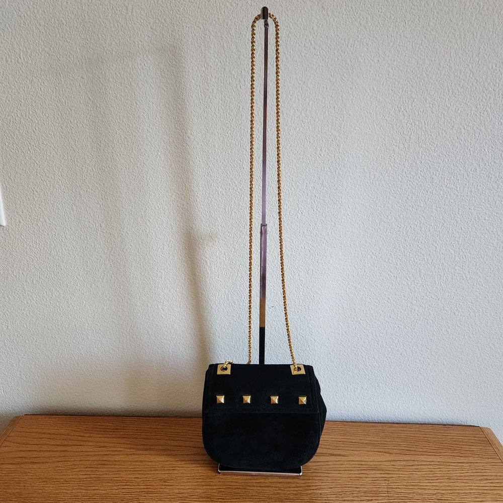 Elegant Black Shoulder Bag with Gold Accents